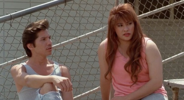 Tito (Eliot) and Lupe (Ingrid Oliu) listen as Mr. Escalante reads the ETS allegations Photo via Warner Bros. Pictures